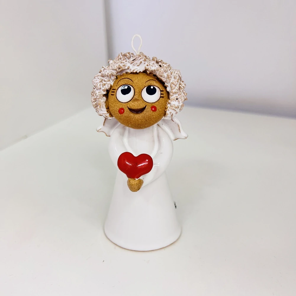 ANDĚL ZVONEČEK - HOLKA SE SRDÍČKEM